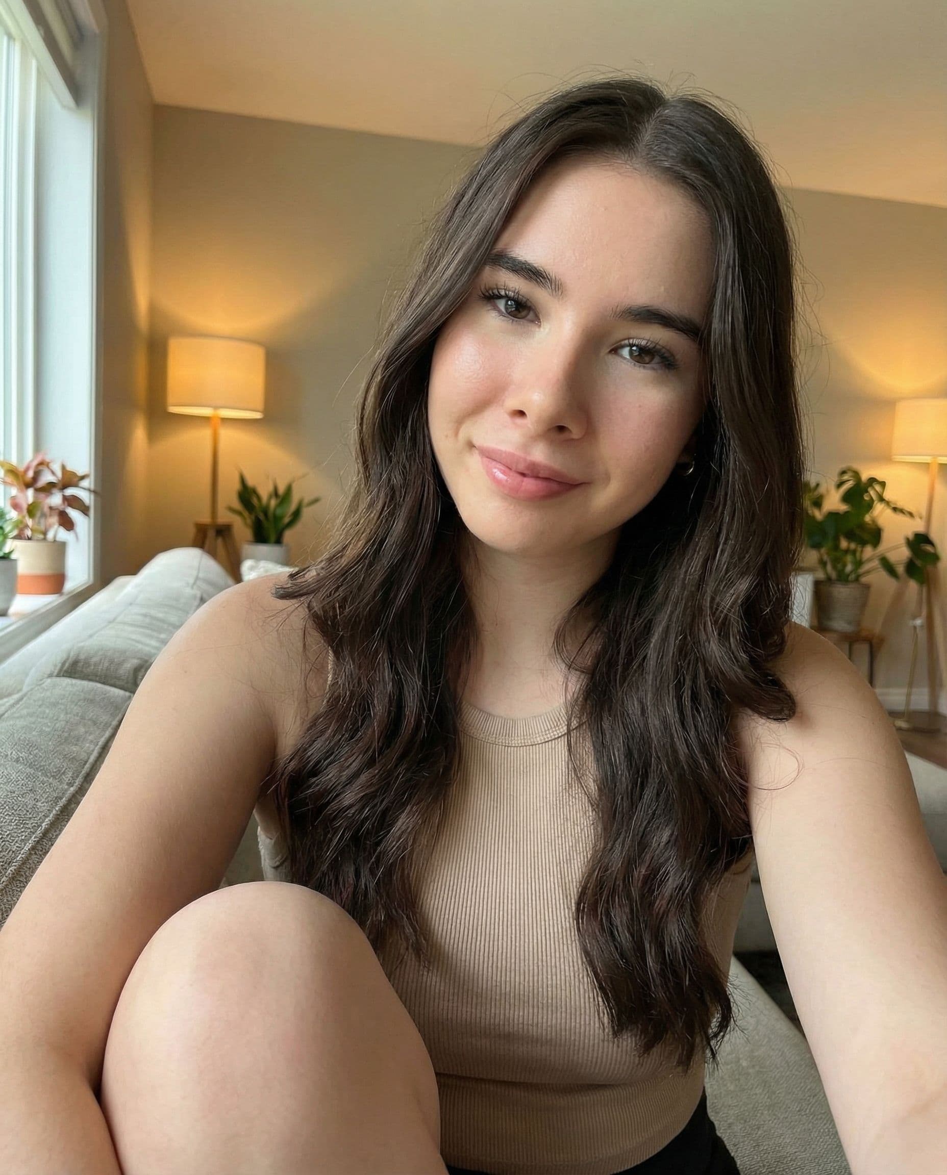 AI generated: Nano Banana prompt: A hyper-realistic selfie of a 22-year-old young br... (Nano Banana - Nano Banana)