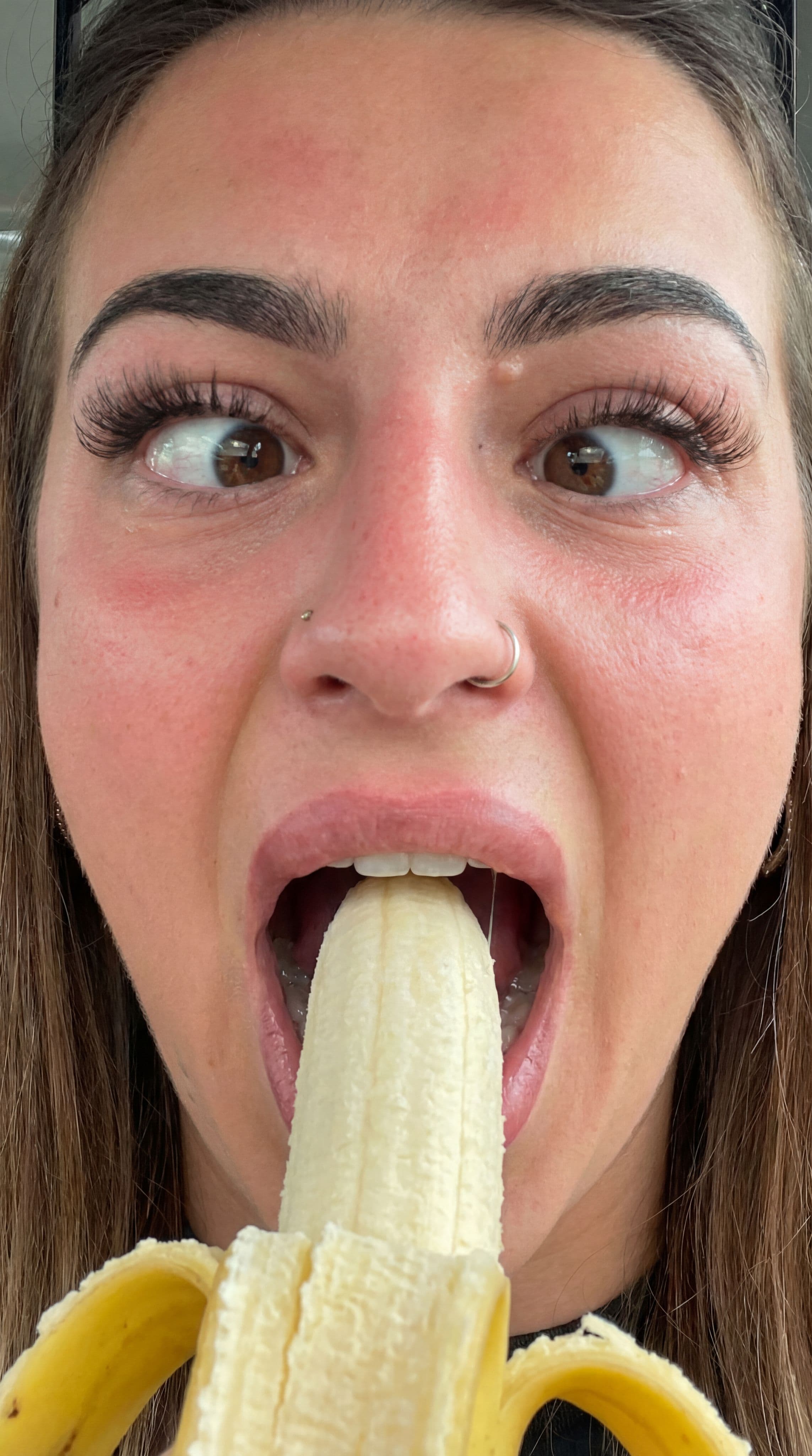 صورة مولدة بالذكاء الاصطناعي: Nano Banana prompt: Generate a photo of me gagging on a banana at the ... (نموذج Nano Banana - Nano Banana)